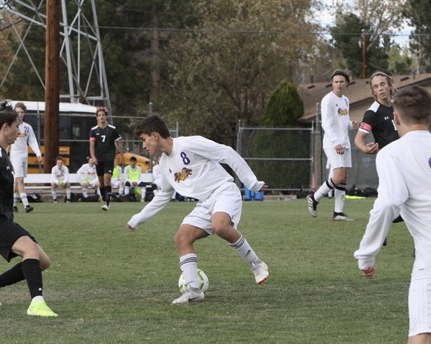 Oliver Garnica playing soccer.