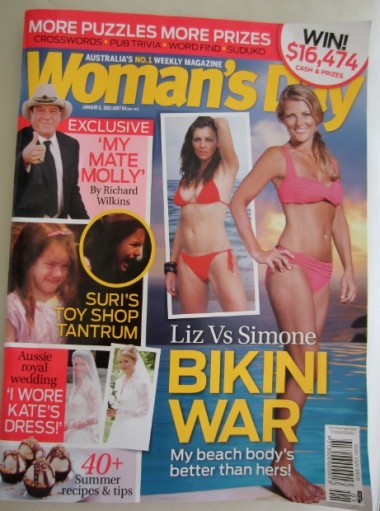A Woman's Day magazine showing two women in bikinis comparing their bodies